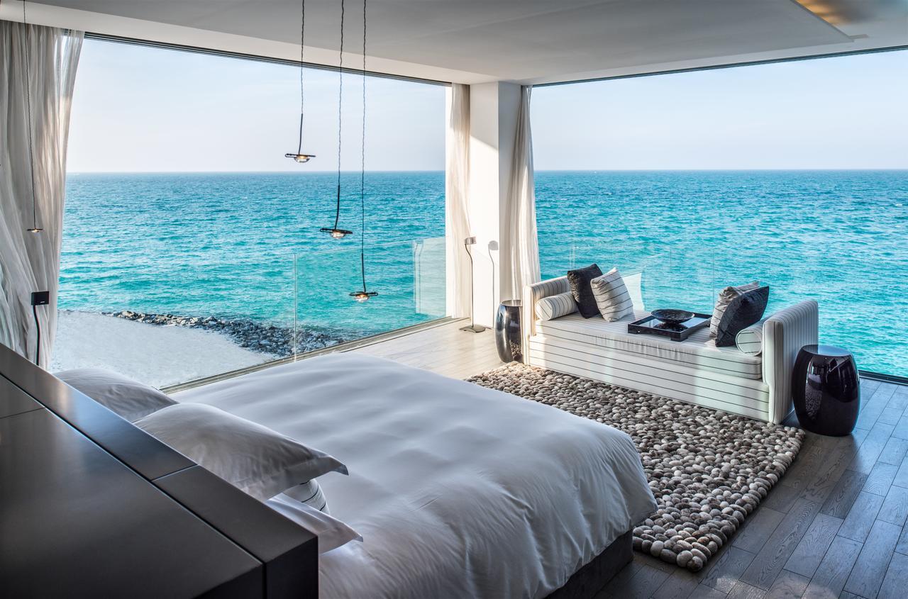 Zaya Nurai Island Resort Abu Dhabi Ruang foto The bedroom of a private villa at the resort